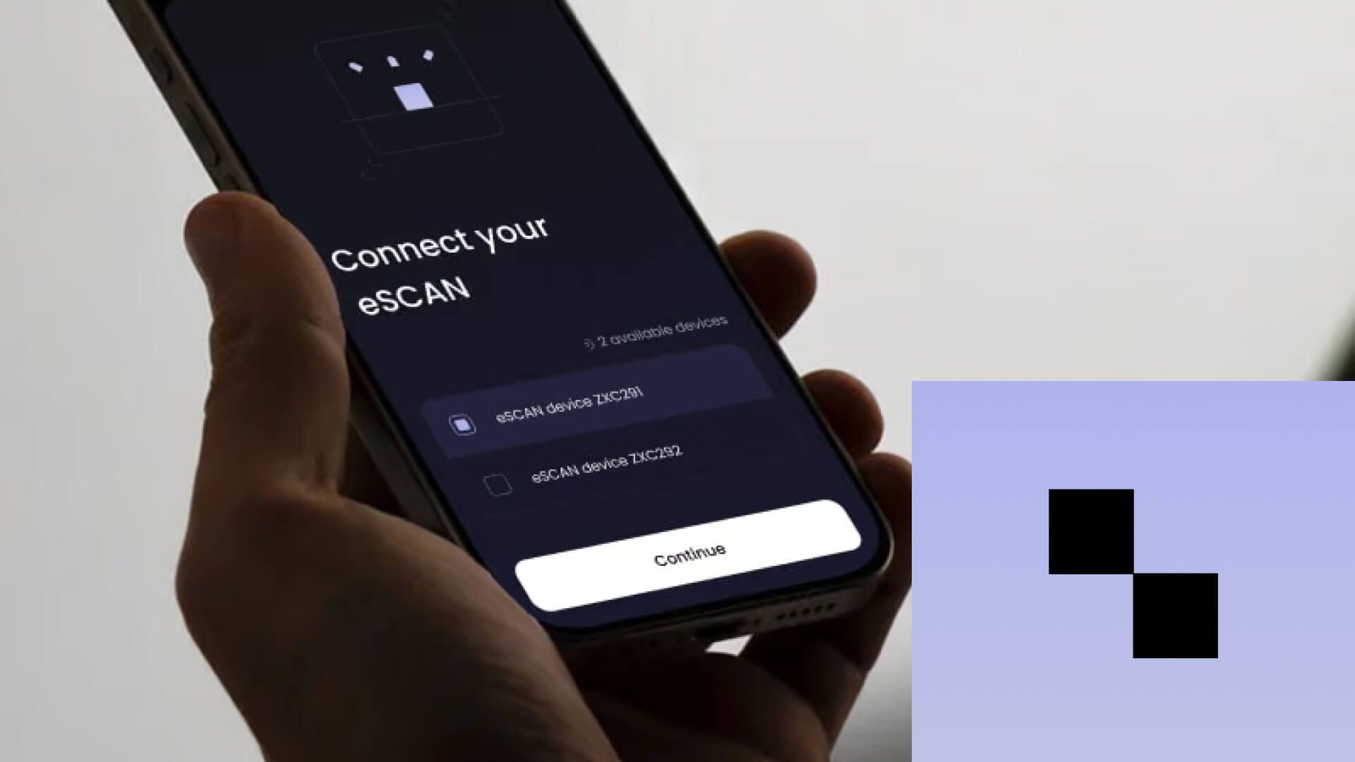 Ruka drží telefon s aplikací eSCAN; na obrazovce je výzva k připojení a seznam dvou nalezených zařízení s tlačítkem Continue